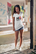 Load image into Gallery viewer, The Hübsch HG Tee is soft and lightweight, with the right amount of stretch. It has a bold HG Logo on the front in Black and Red.
