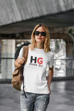 Load image into Gallery viewer, The Hübsch HG Tee is soft and lightweight, with the right amount of stretch. It has a bold HG Logo on the front in Black and Red.
